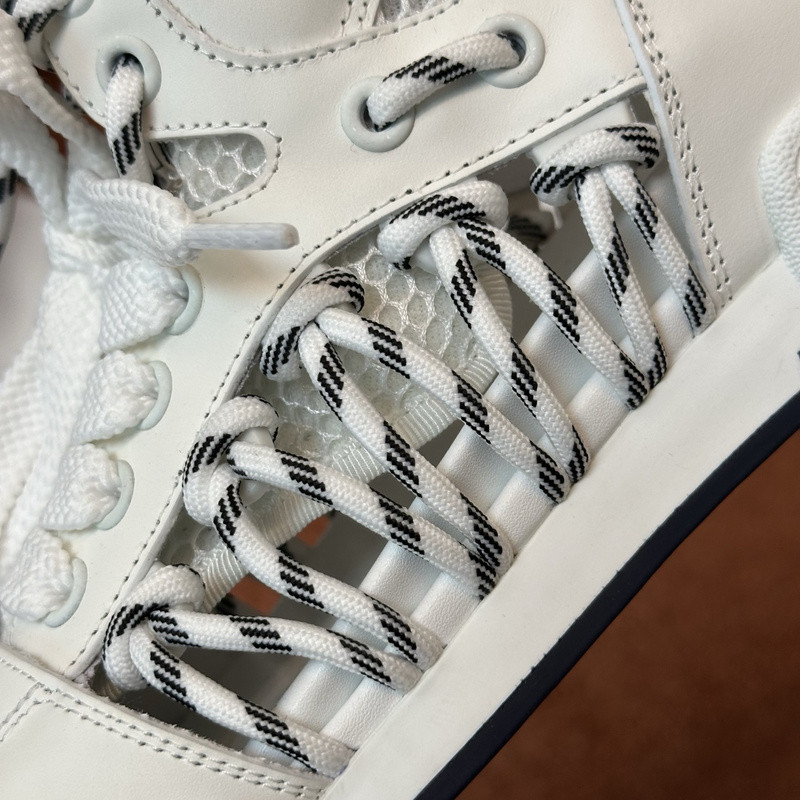 D10r first high-top sneaker