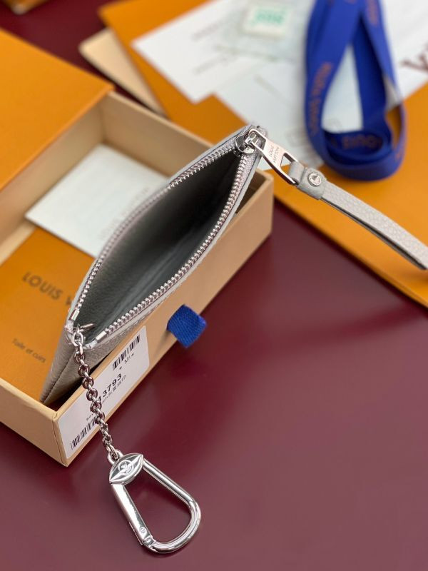 l0vis Vvtt0n key pouch bicolor monogram empreinte leather